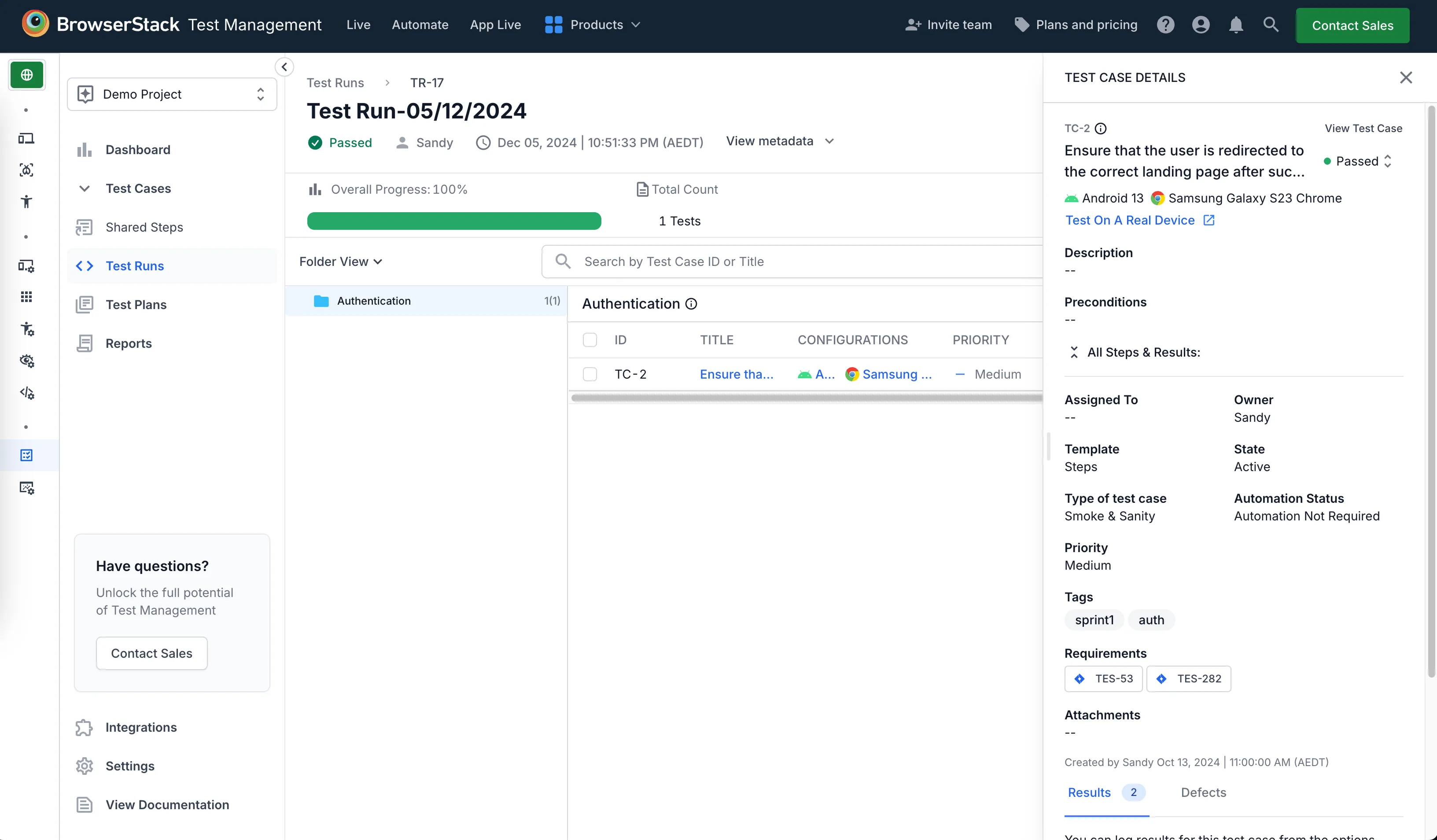 BrowserStack Test Management: a test run at 100% progress over one test, an Authentication folder holding test case TC-2 in a four column list, and a Test Case Details panel open beside it with the case's status, device configuration, owner, state, priority, tags, linked requirements, and Results and Defects tabs.